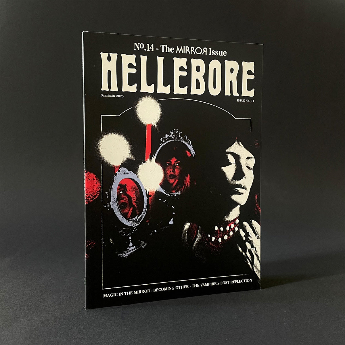 Magazine cover titled 'Hellebore' with artistic design on a dark background