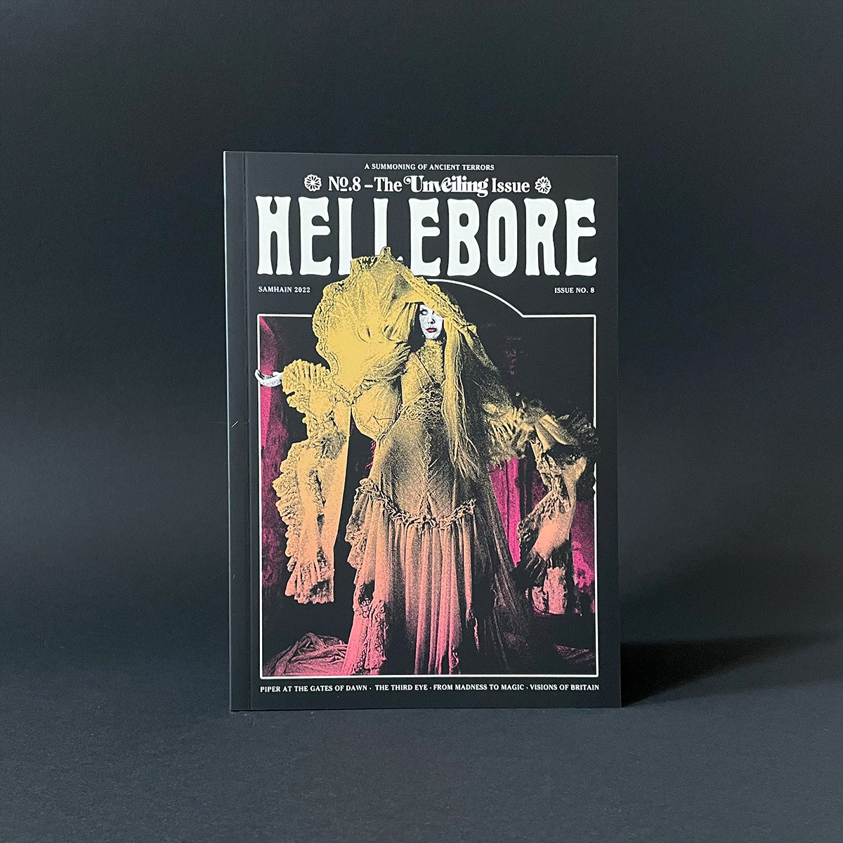 Magazine cover titled 'Hellebore' with a dark background