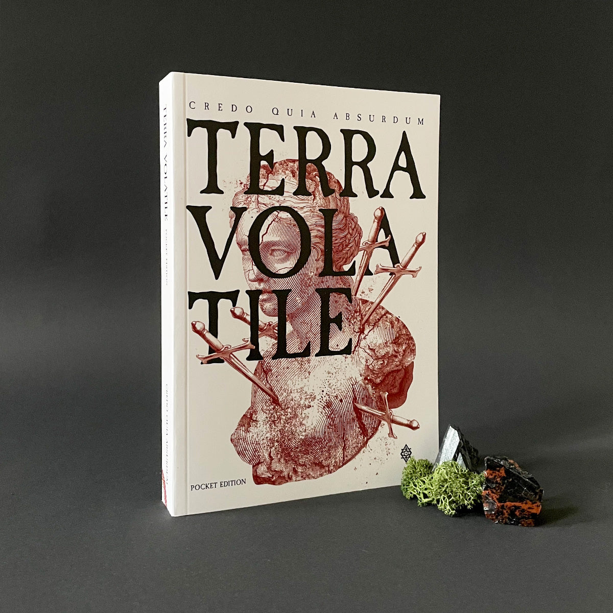 Book titled 'Terra Volatile' with a dark background