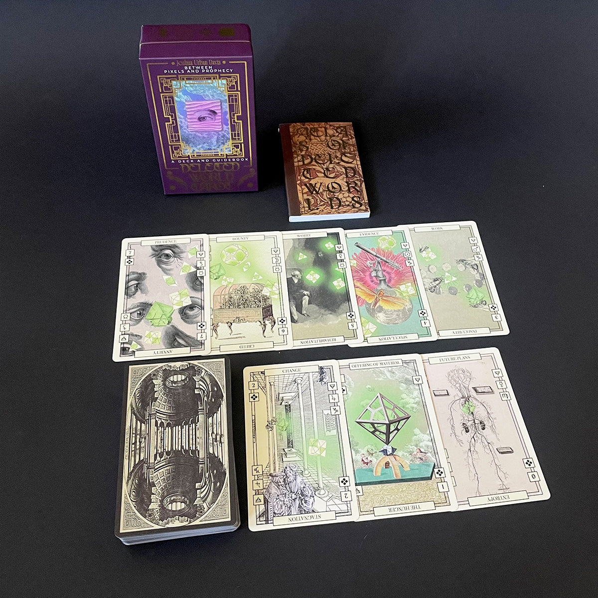 Collection of tarot cards and a box on a dark background