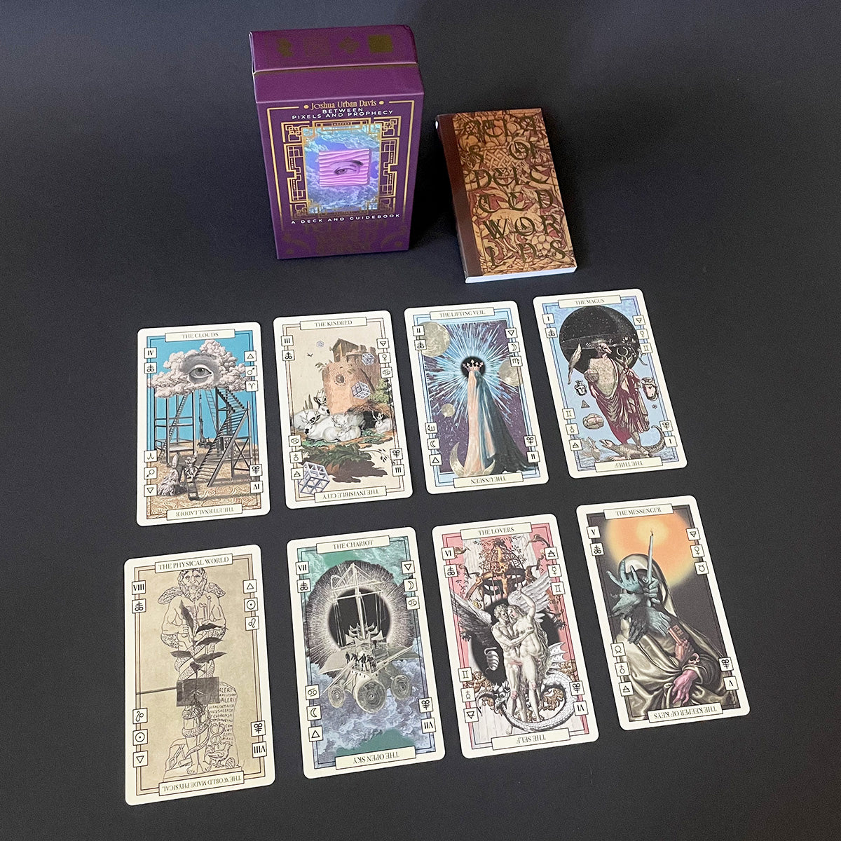 Set of tarot cards with a box on a dark background