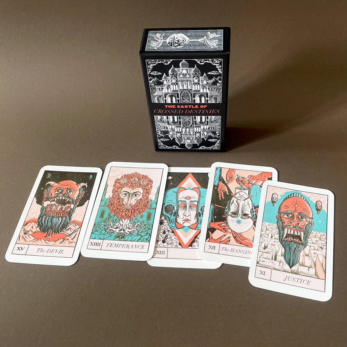 Collection of tarot cards and a box on a dark background